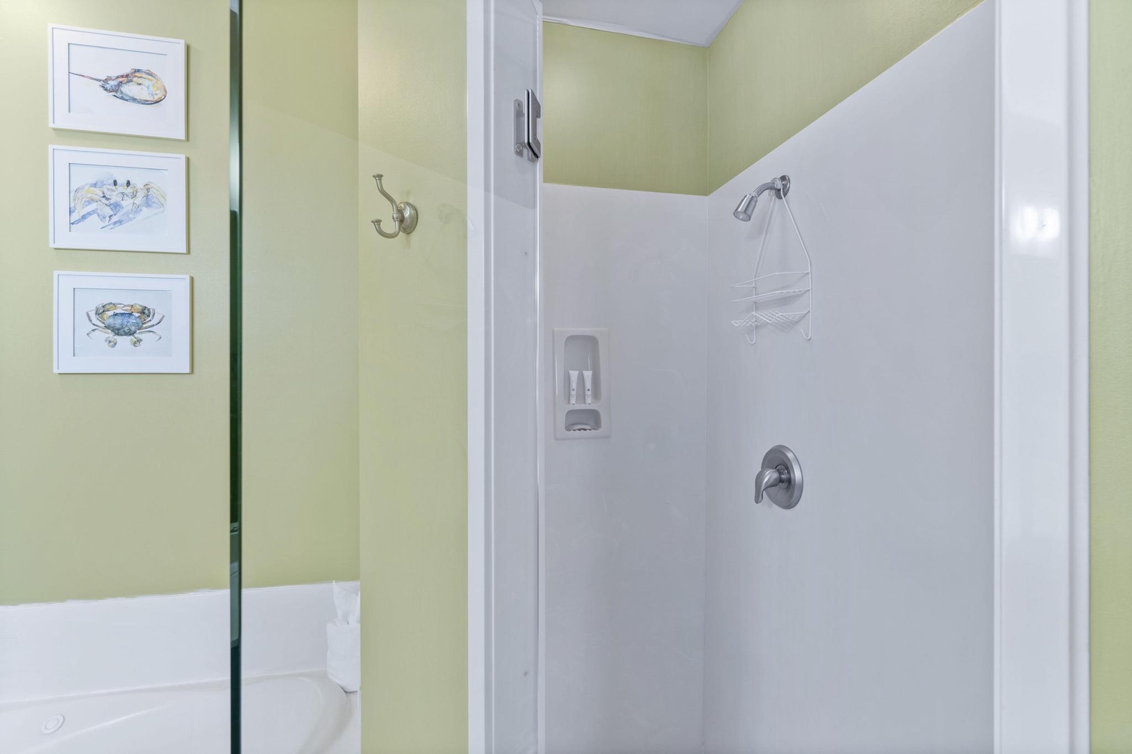 The large master bath has a double sink, over-sized shower, and a jetted jacuzzi tub
