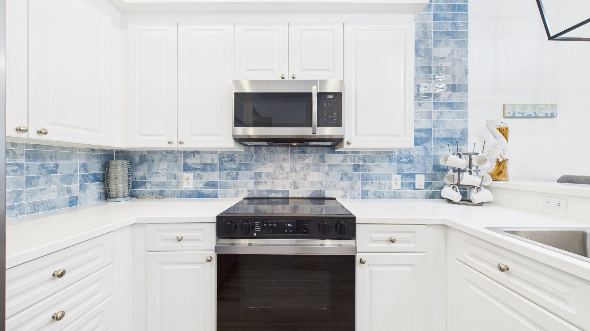 Full kitchen with stainless appliances and all the cooking essentials