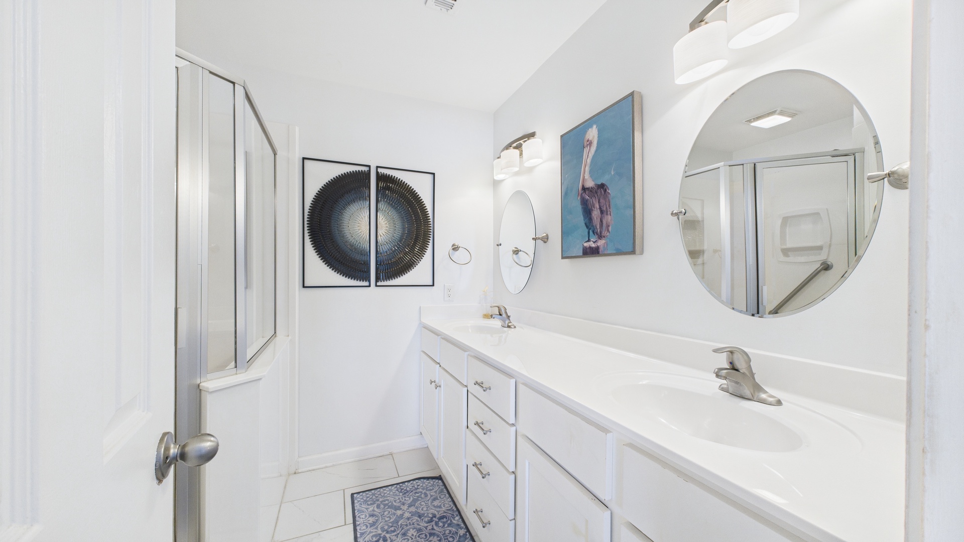 Master bathroom with dual vanity and walk in shower