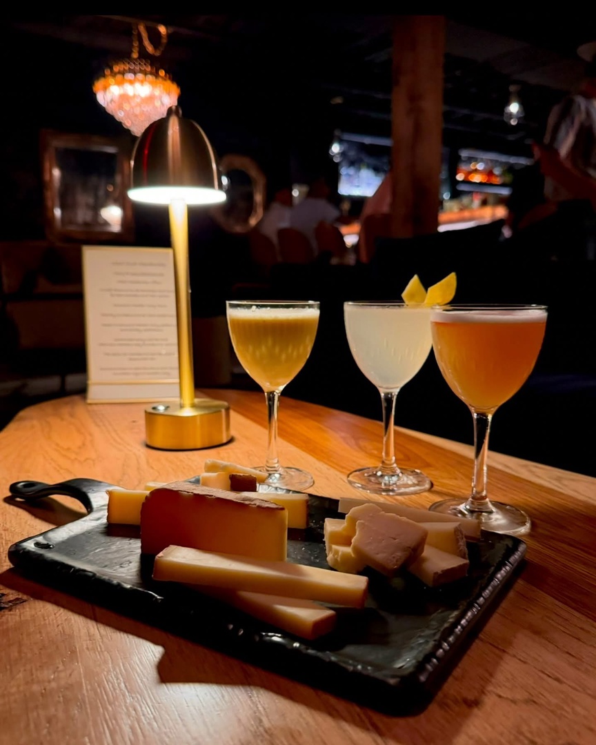 The 1865 Club is a distinctive speakeasy-style cocktail lounge located in Nashville's Midtown neighborhood. Nestled in the basement of a historic building at 610 21st Avenue North