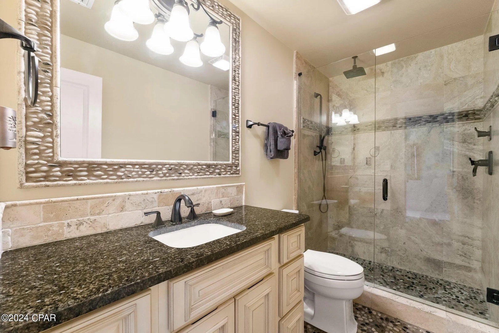 Full bathroom one with a stand up shower