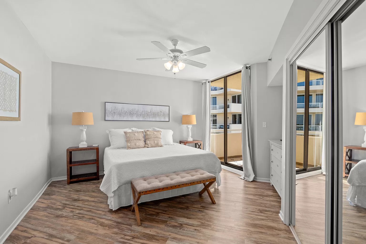 Master bedroom with king bed and access to balcony (sleeps 2)