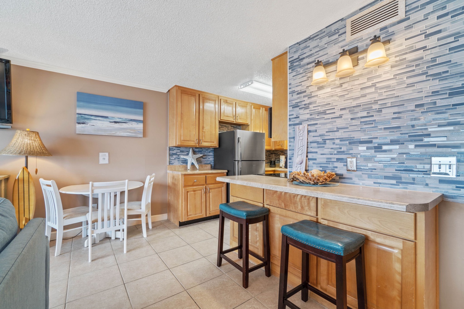 Kitchen area with bar seating