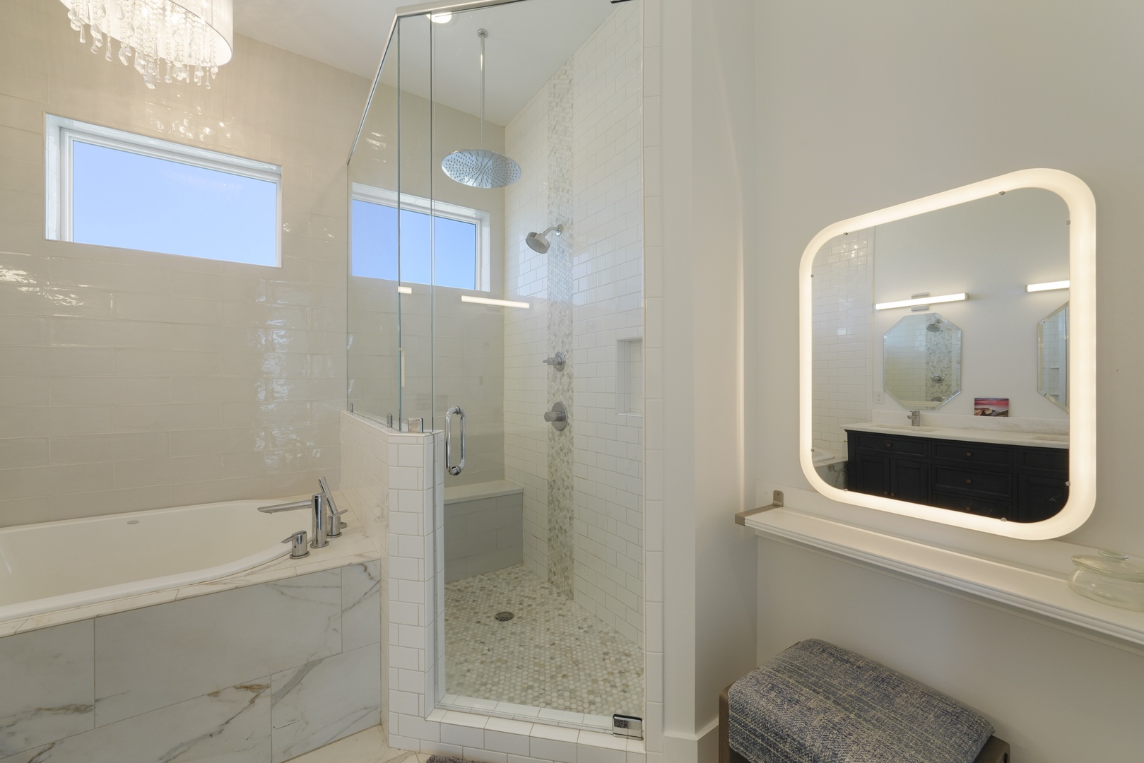 Makeup counter and walk in shower in the bathroom