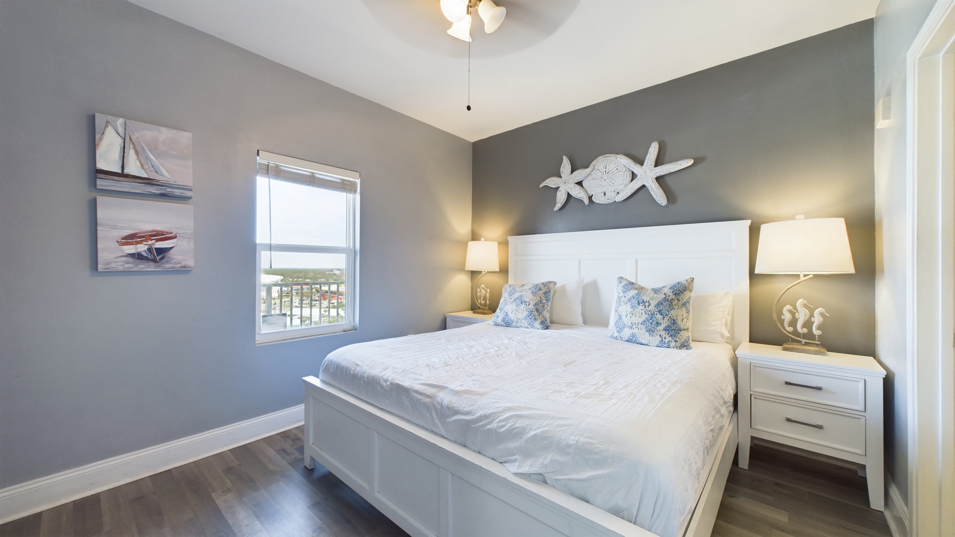 Primary bedroom with king bed and ensuite bathroom