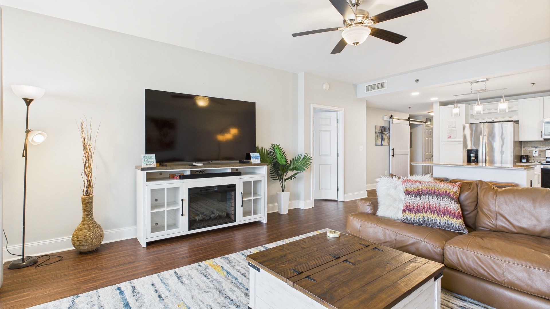 Huge TV in living area with sound system