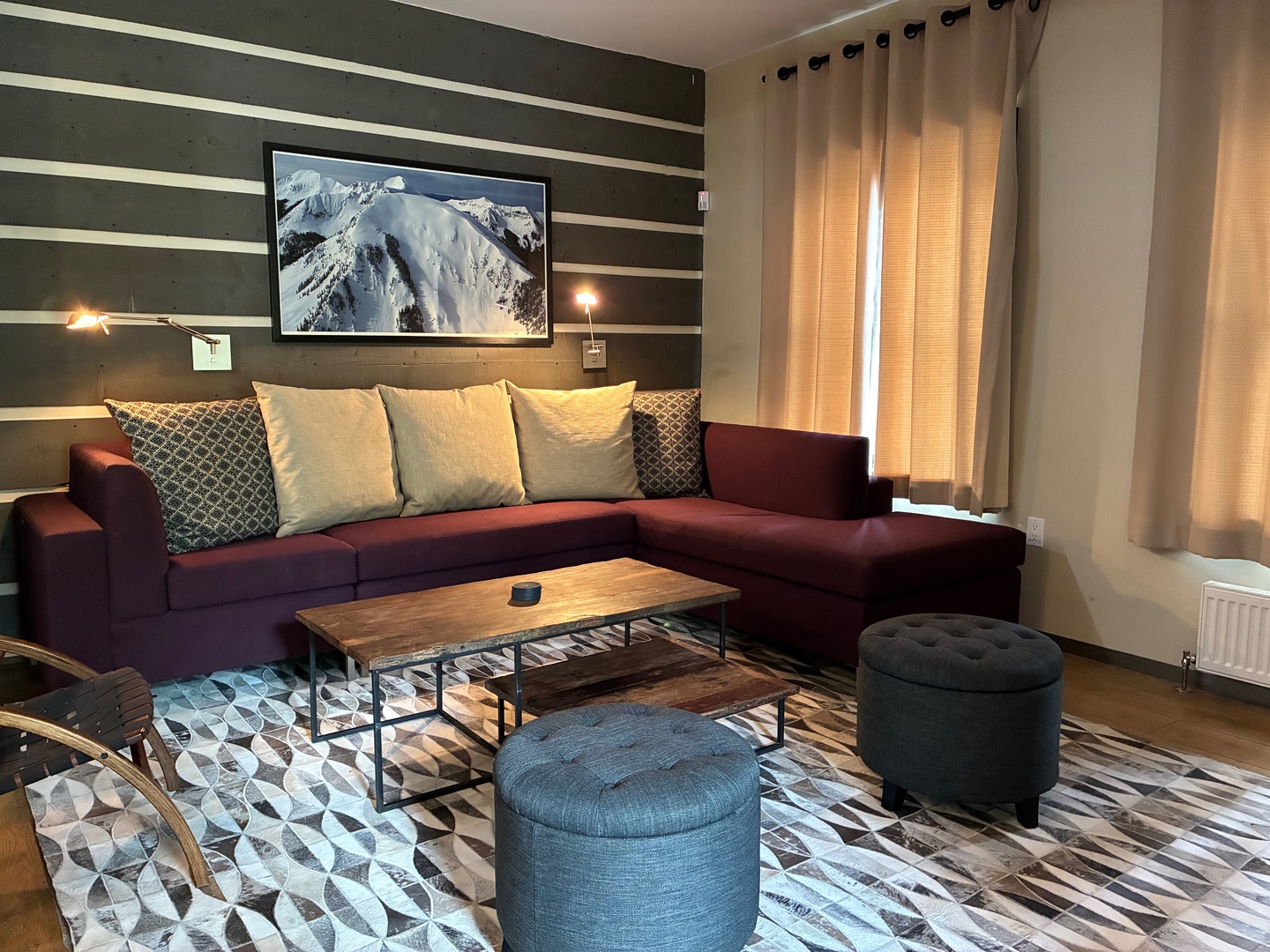 Sink into plush seating and unwind in your stylish living space, thoughtfully designed with warm textures and modern accents to make you feel completely at home.
