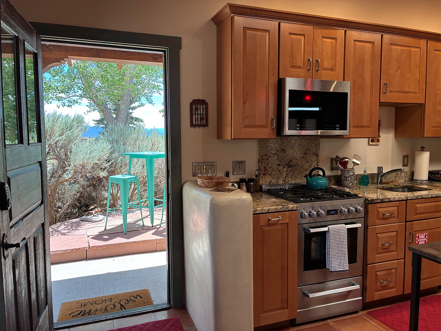 Beautiful outdoor patio just outside the kitchen.
