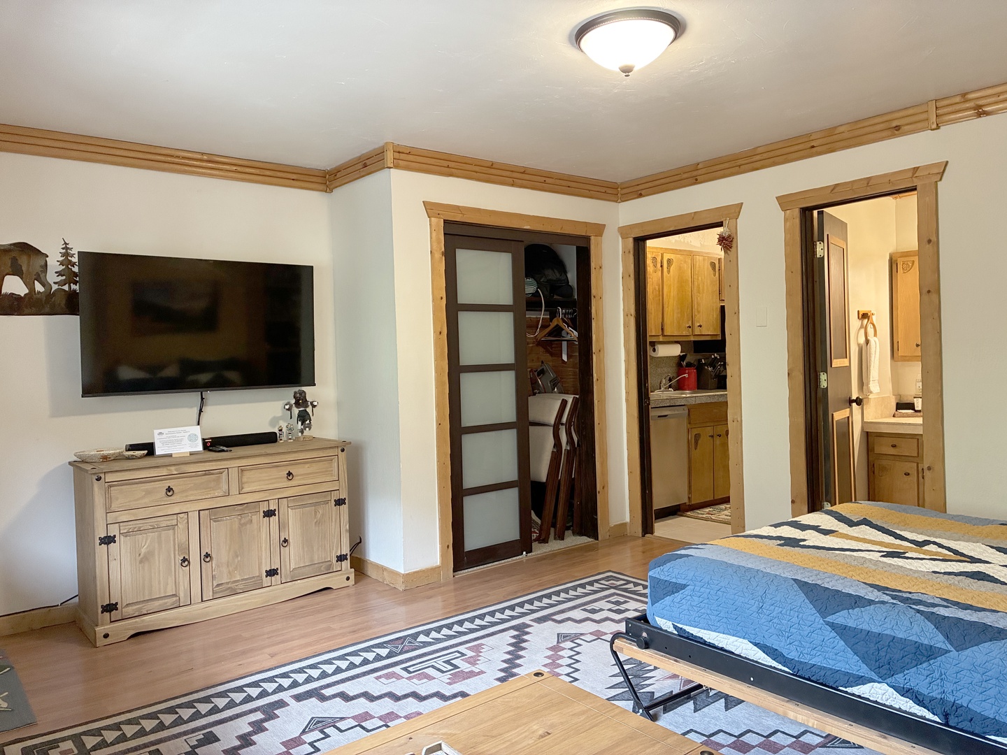 55" 4K Smart Fire TV in the living area/convertible sleeping space