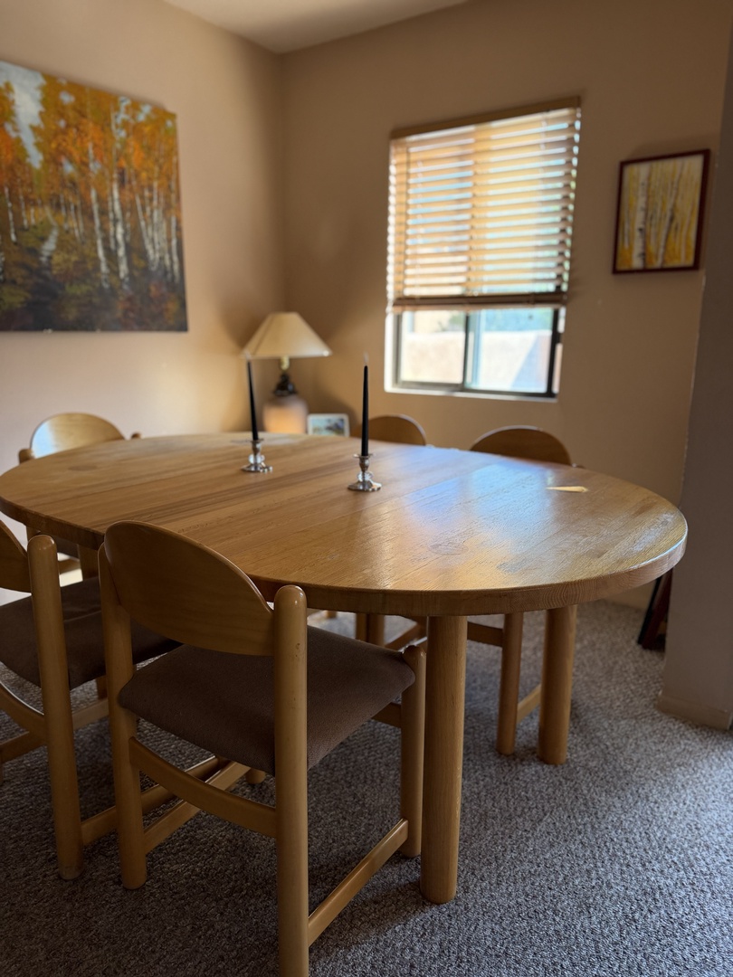 Enjoy meals in the dining area at a comfortable table.