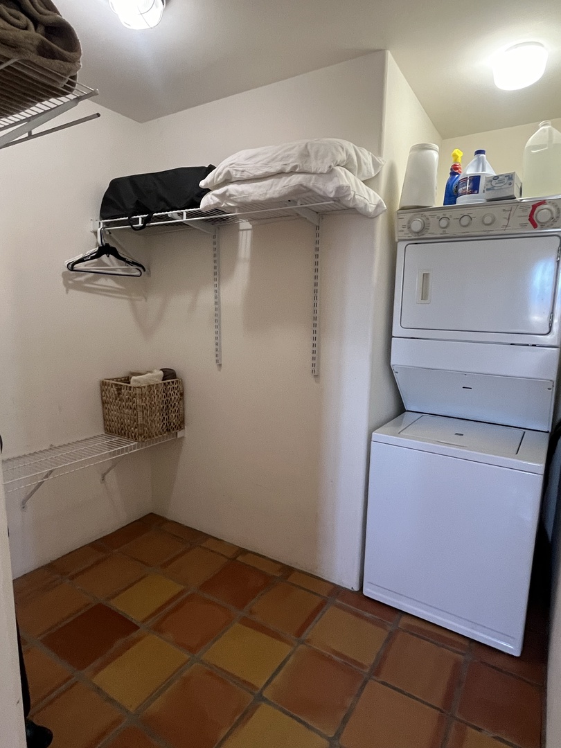 Your private laundry room keeps everything fresh with a full washer and dryer plus organized storage.