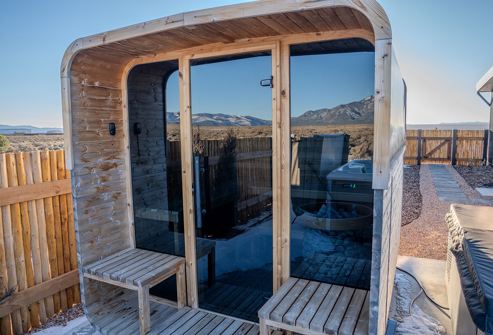 Unwind in your private sauna pod with sweeping mountain views, offering the perfect blend of warmth and serenity.