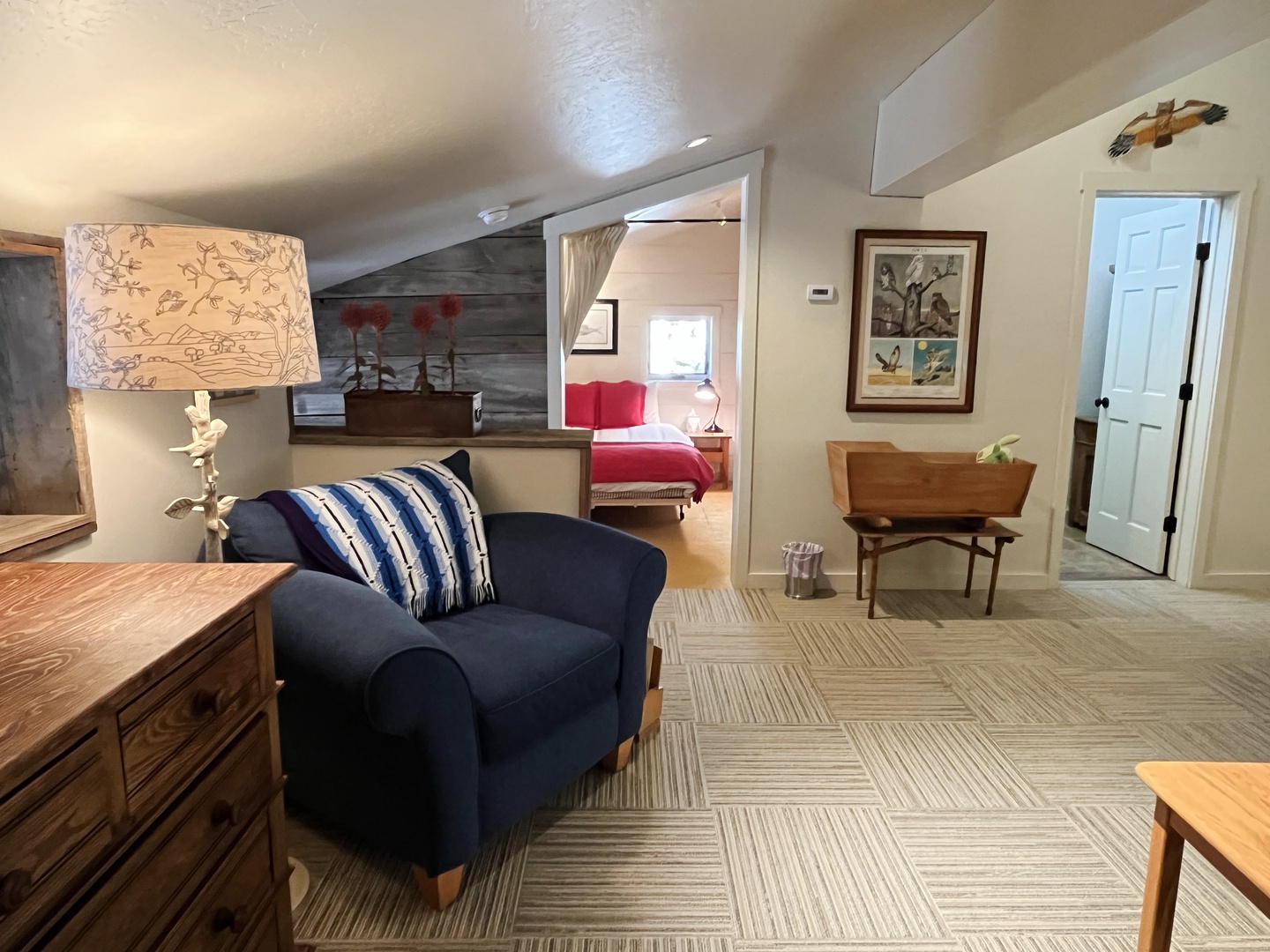 Cozy loft seating area and crib