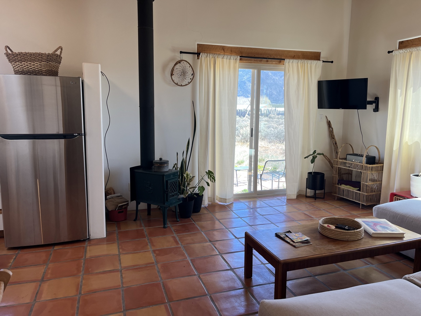 Relax in your bright living space with mountain views, modern amenities, and rustic charm that makes you feel right at home.