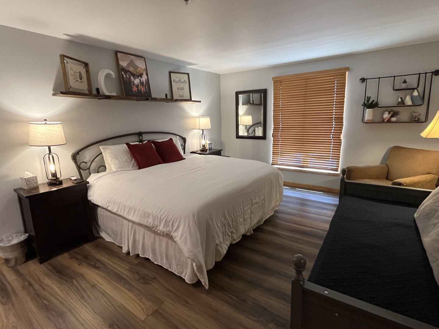 Unwind in your cozy bedroom with crisp linens, warm lighting, and thoughtful touches. Settle into the plush bed after a day of adventure.
