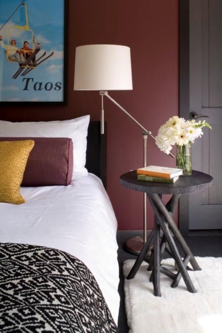 Sink into crisp white linens and colorful pillows that invite you to unwind after a day of adventure. Fresh flowers and thoughtful touches make this your cozy retreat.