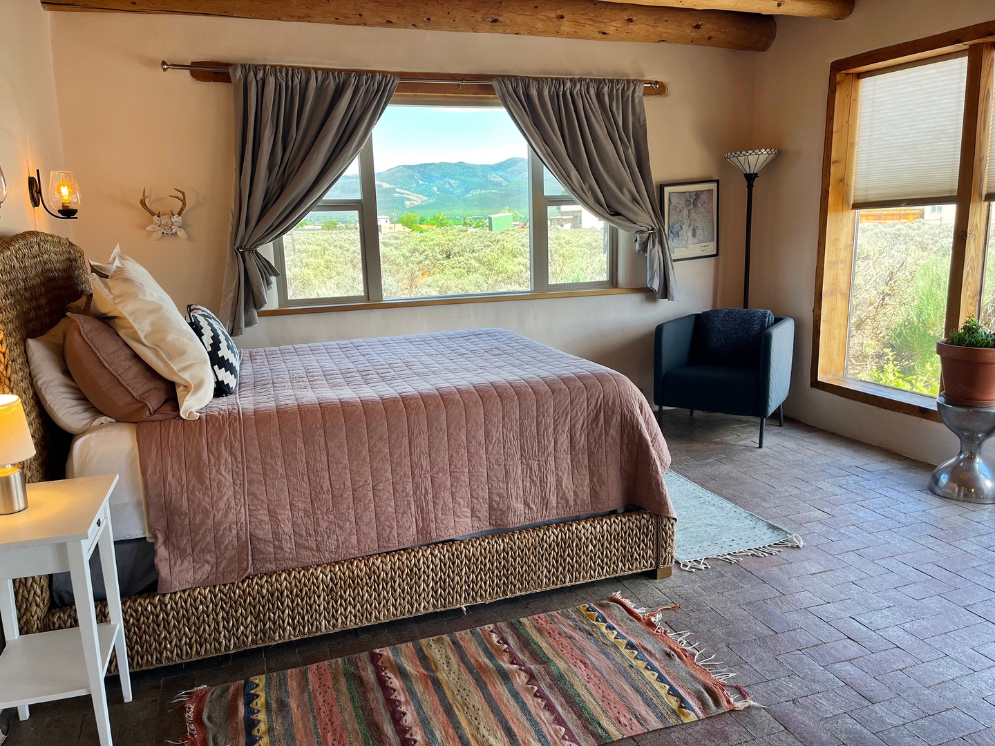 Wake up to mountain views in cozy linens and a comfortable bed.