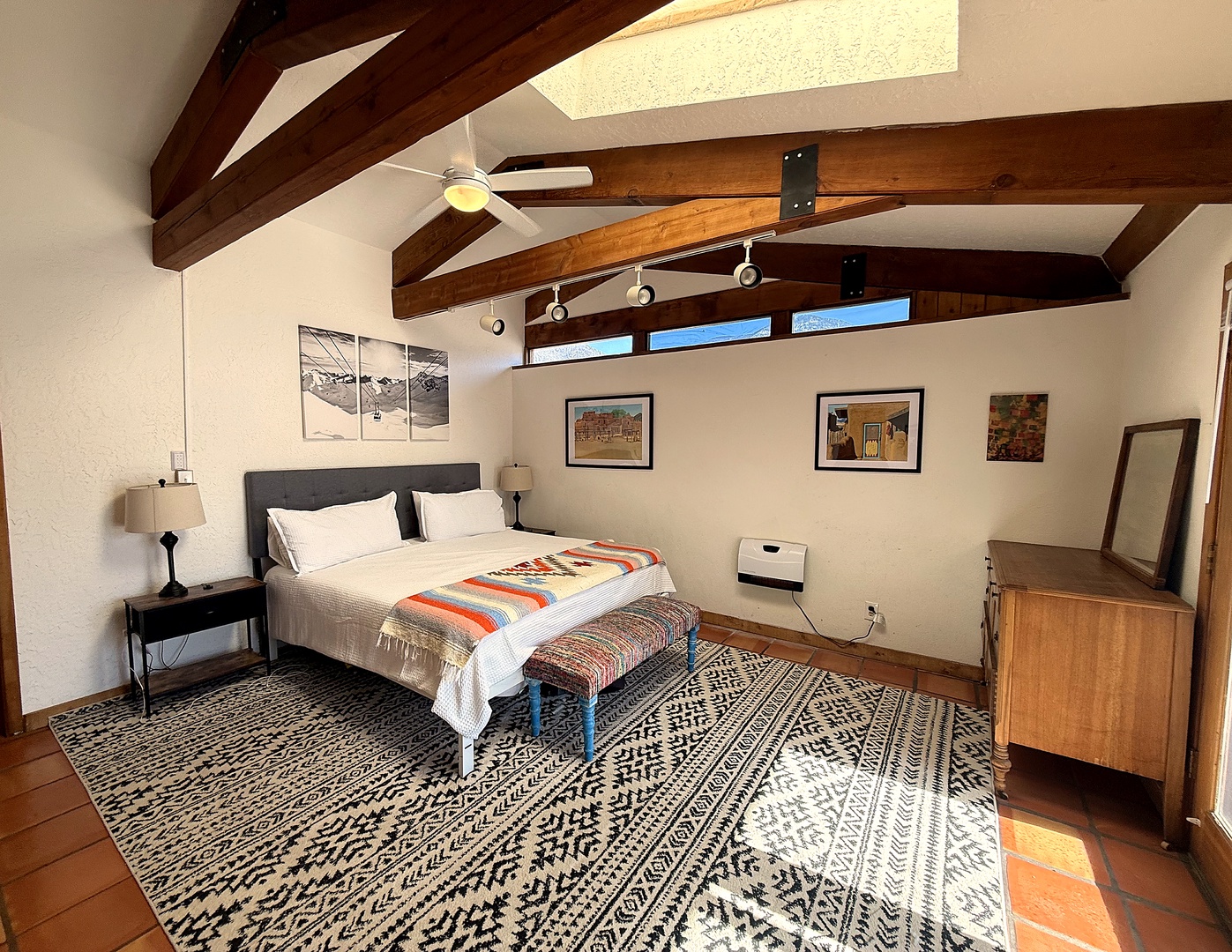 Comfortable and light-filled king bedroom