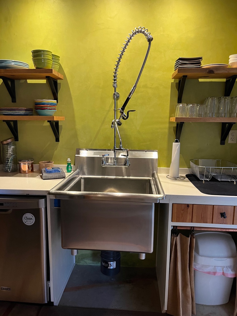Big pot filler and boot sink in the kitchen auxillary area