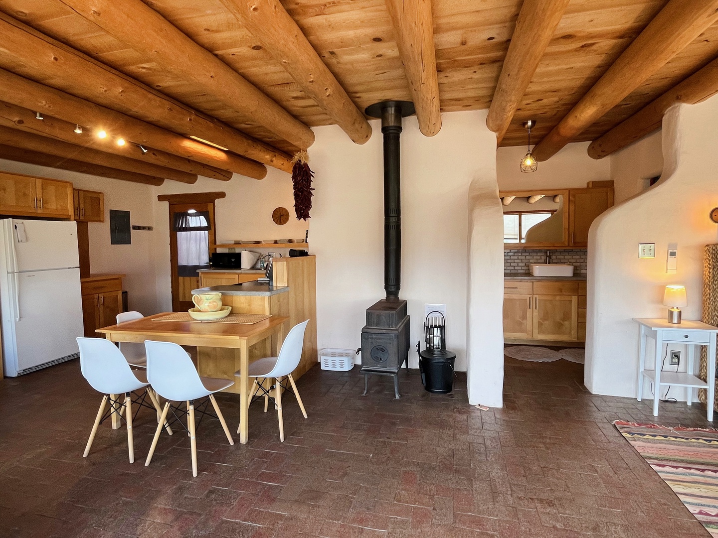 Great dining and wood stove for extra cozy evenings