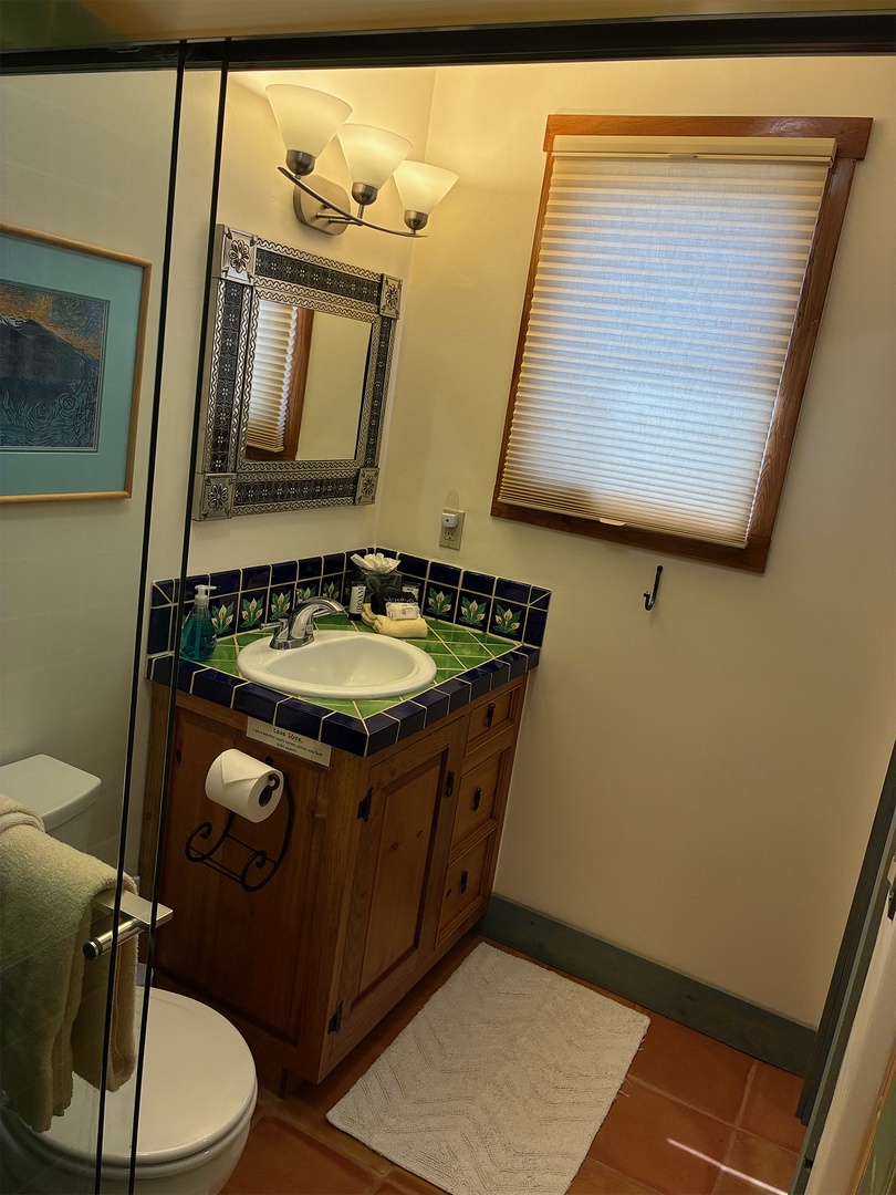 Colorful Talavera tile accents this bright bathroom