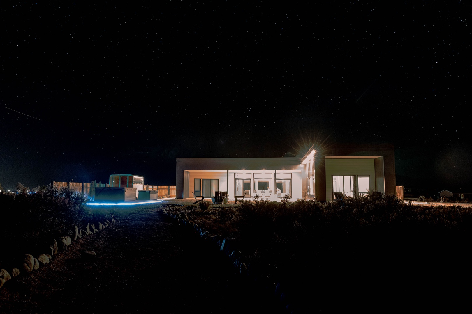 Casa de Luz illuminated under a stunning canopy of stars, offering a peaceful escape