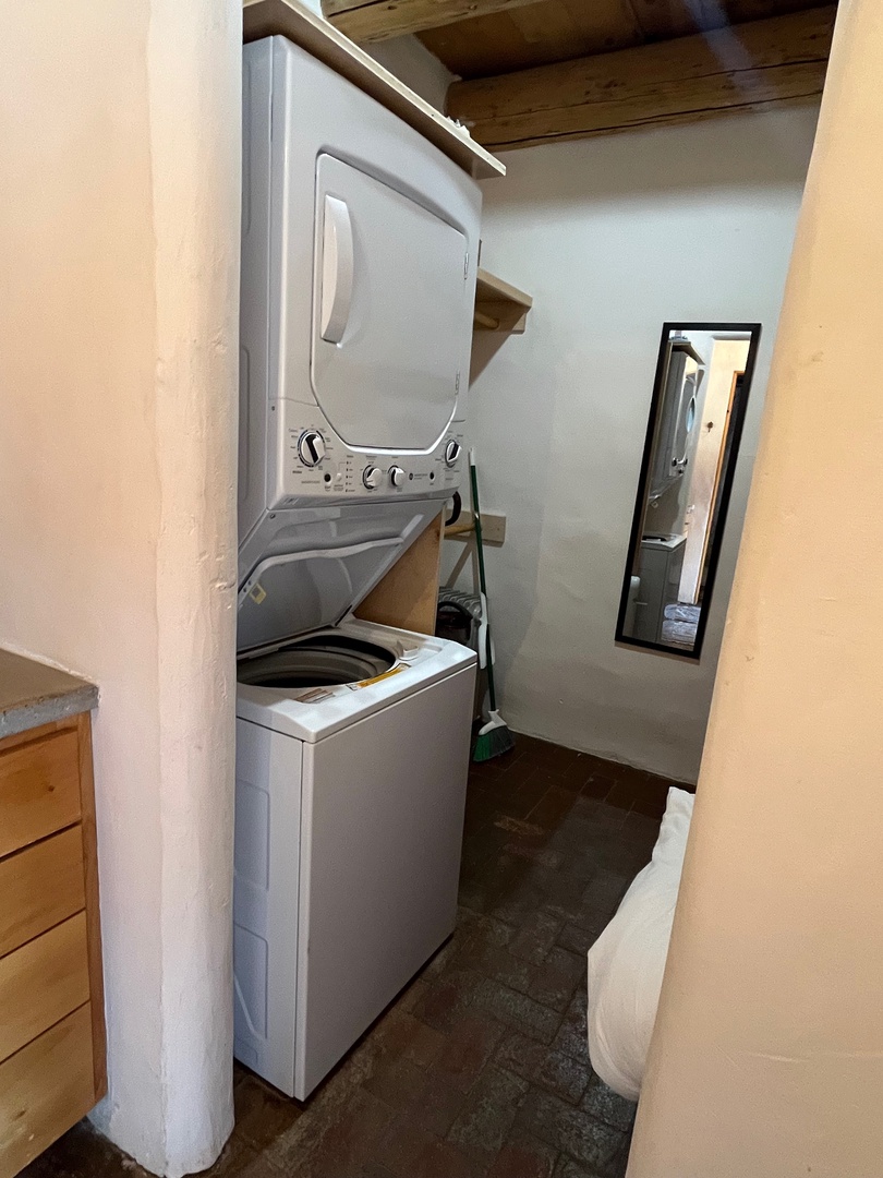 Washer and dryer near the bathroom