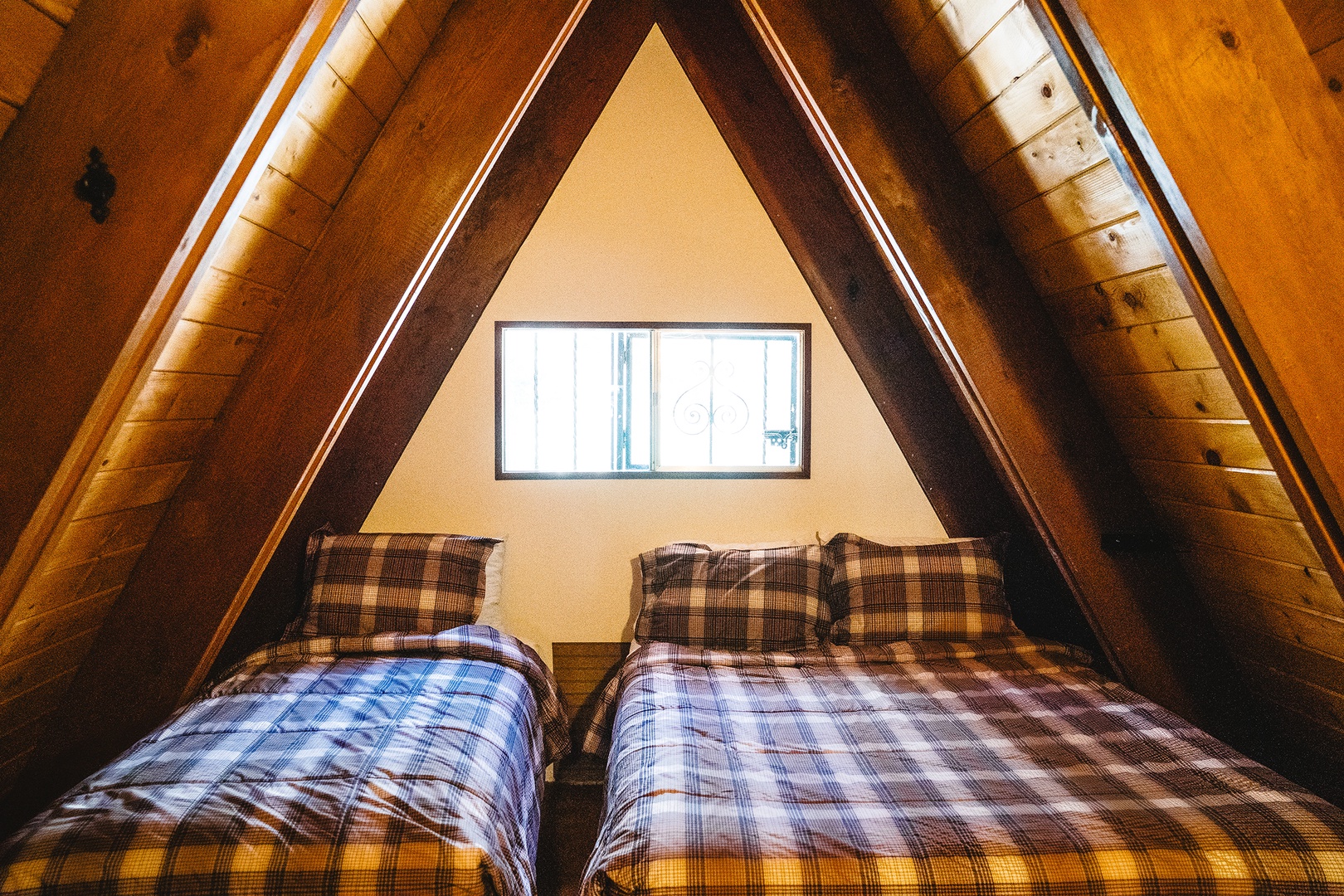 Second upstairs bedroom with twin and full beds