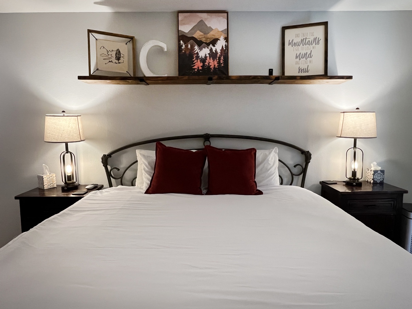 Sink into crisp linens and plush pillows after a day exploring. Your cozy mountain-themed bedroom awaits with elegant touches and warm ambient lighting for restful evenings.