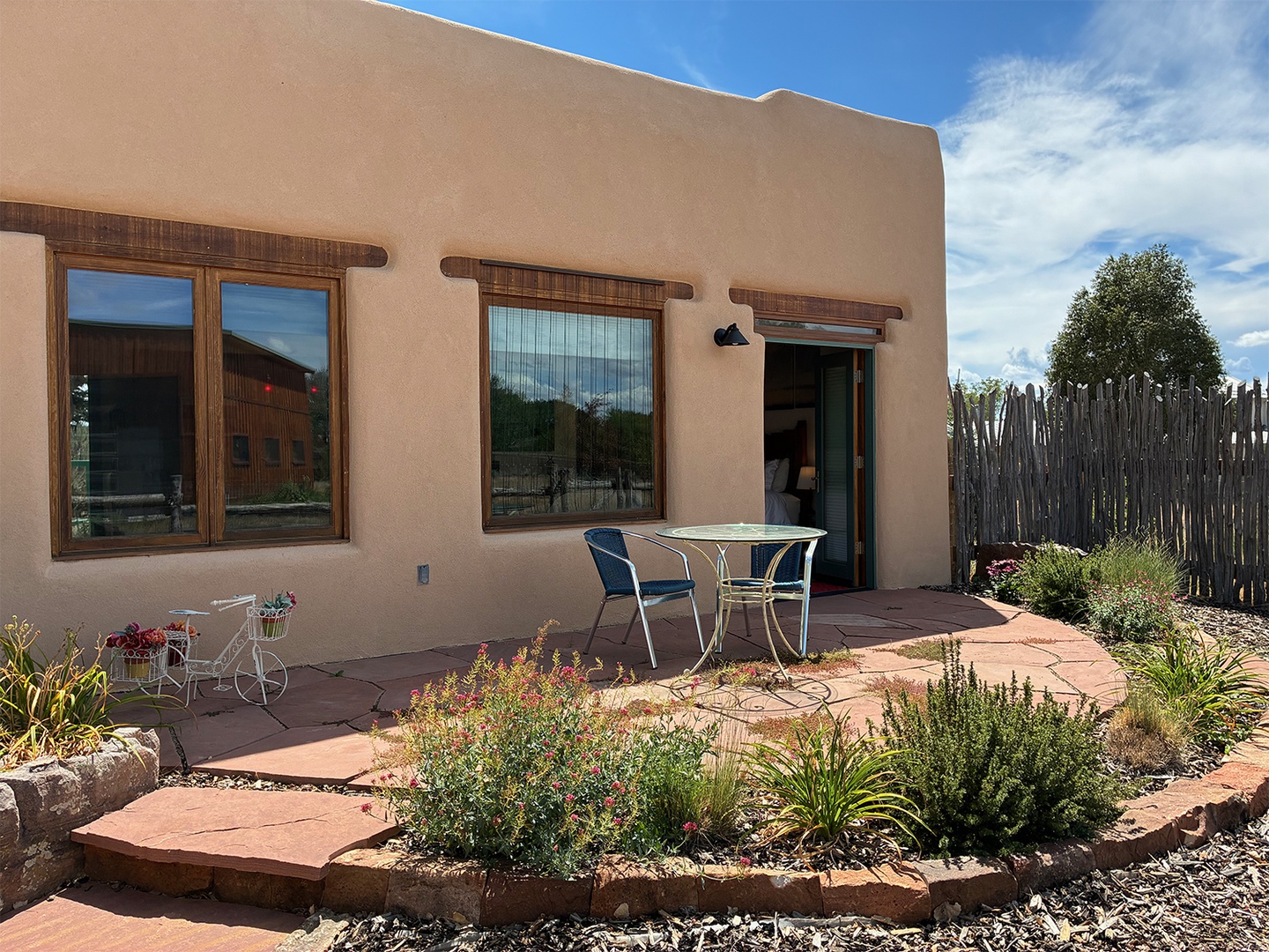 Your private patio surrounded by desert blooms and mountain breezes invites you to dine outdoors and soak in the peaceful Southwest charm.