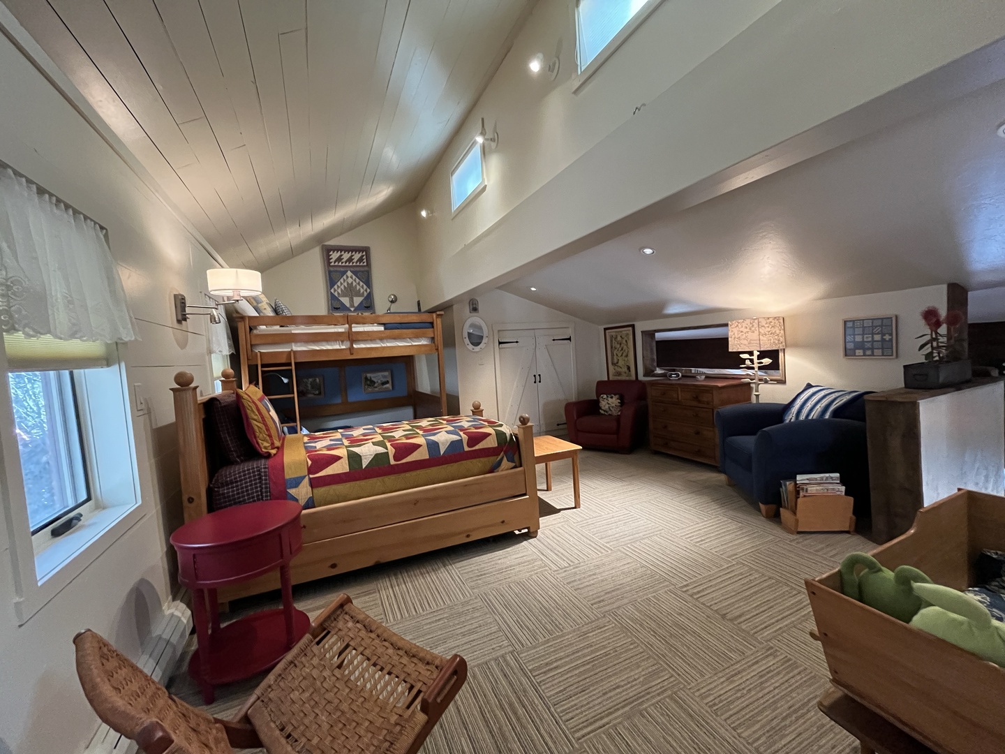 Wide angle view of spacious loft area, great for family