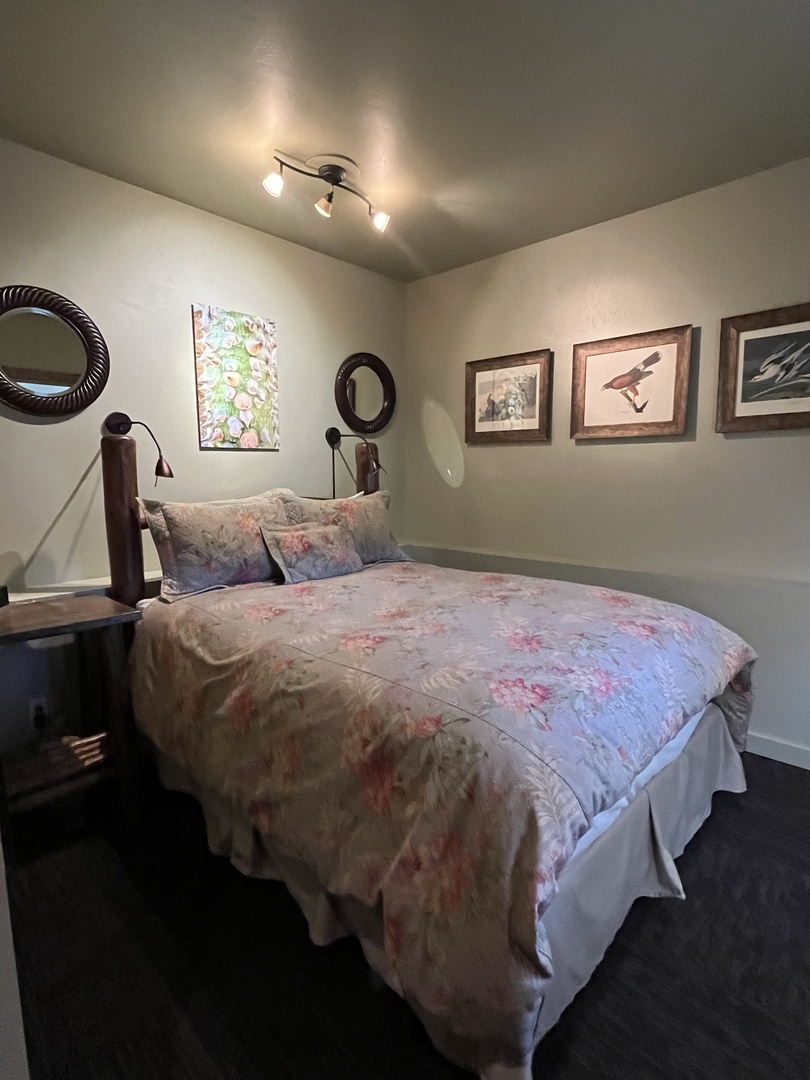 Downstairs Queen Bedroom with reading lamps