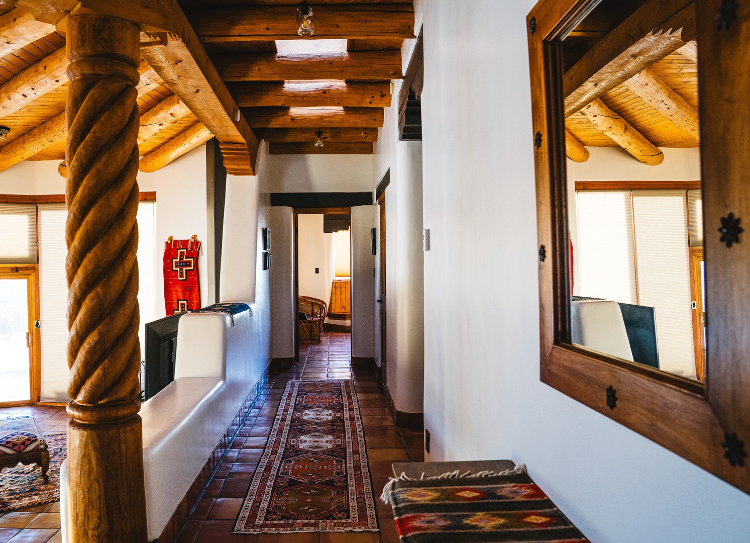 Step into your own Southwestern sanctuary with hand-carved vigas, authentic tile floors, and Native American artistry creating a warm, culturally rich atmosphere.