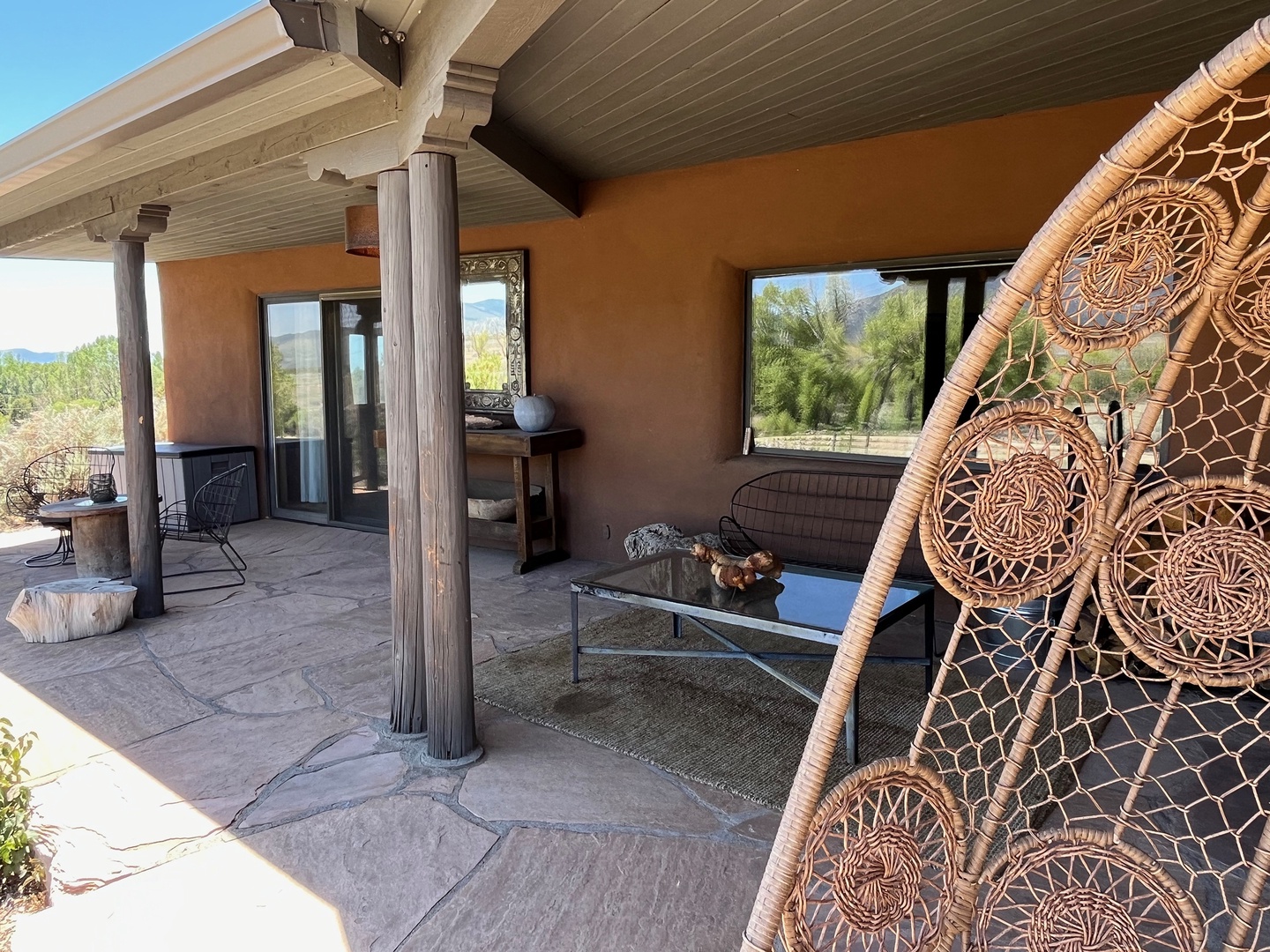 Walk out of the bedroom to your serene covered patio with southwestern charm.