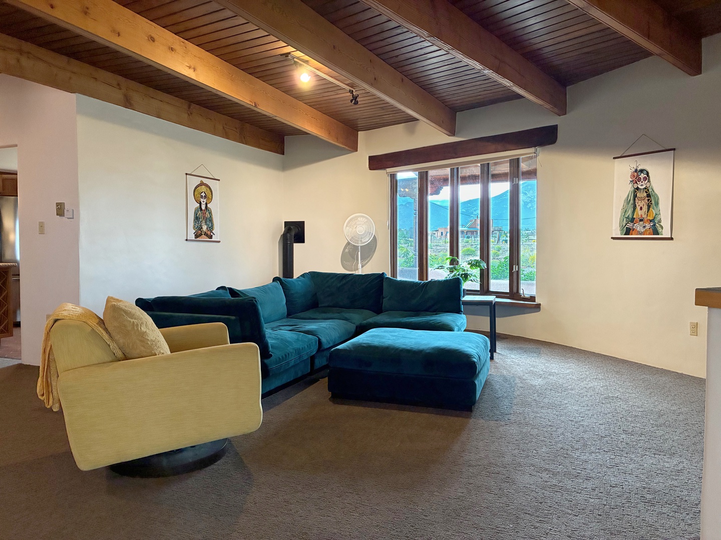Stretch out in your spacious living room with vaulted wood-beam ceilings and stunning mountain views just beyond your window. This is where you'll unwind after exploring the valley.