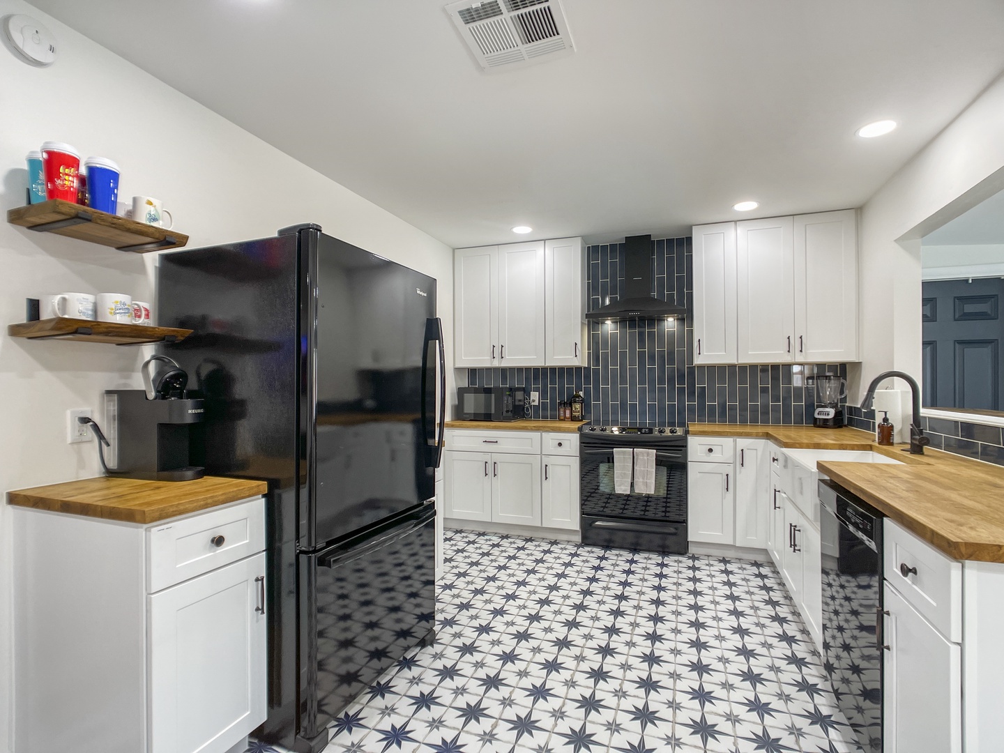 For those who like to cook, the kitchen has modern appliances including: dishwasher, fridge, blender, stove top, Keurig coffee maker, pots and pans, utensils.