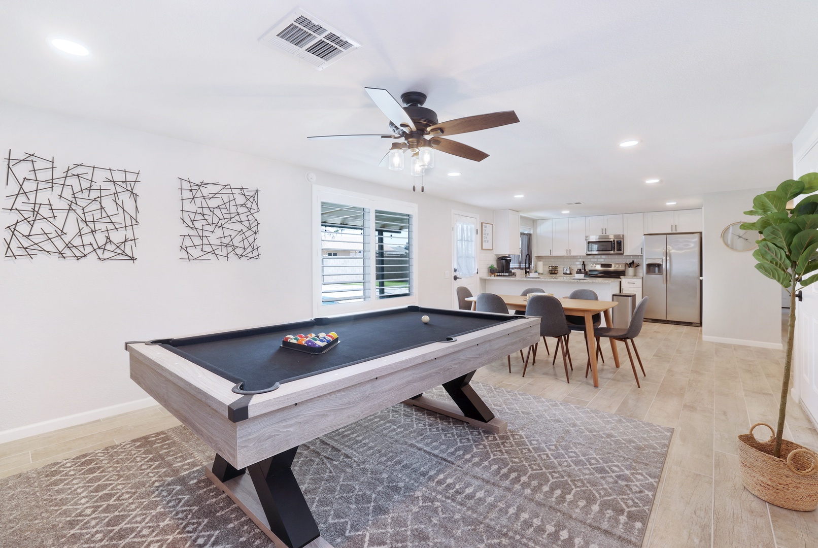 Pool table right off of the dining room