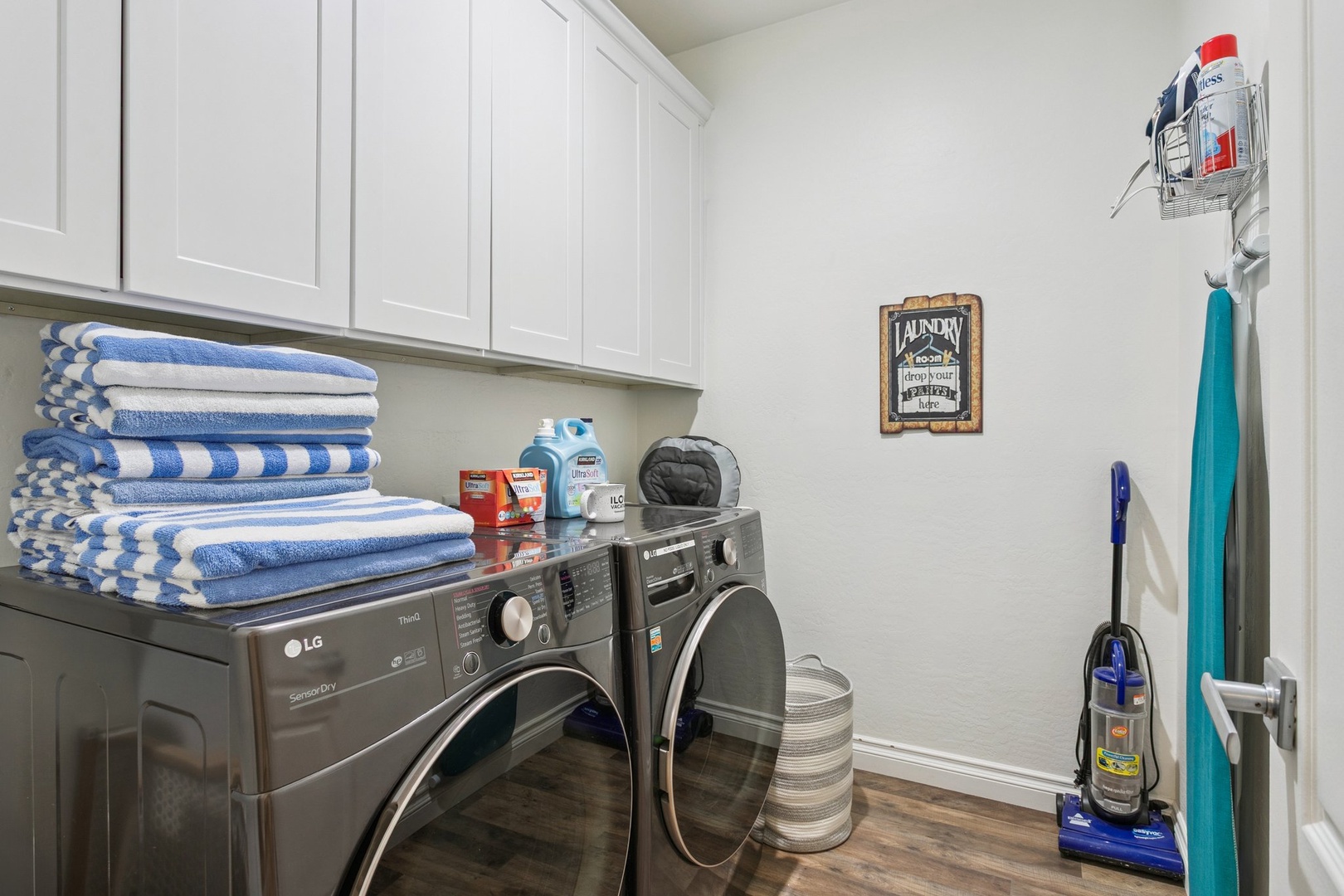 Your dedicated laundry room keeps your vacation wardrobe fresh with modern washer, dryer, and plenty of storage space.