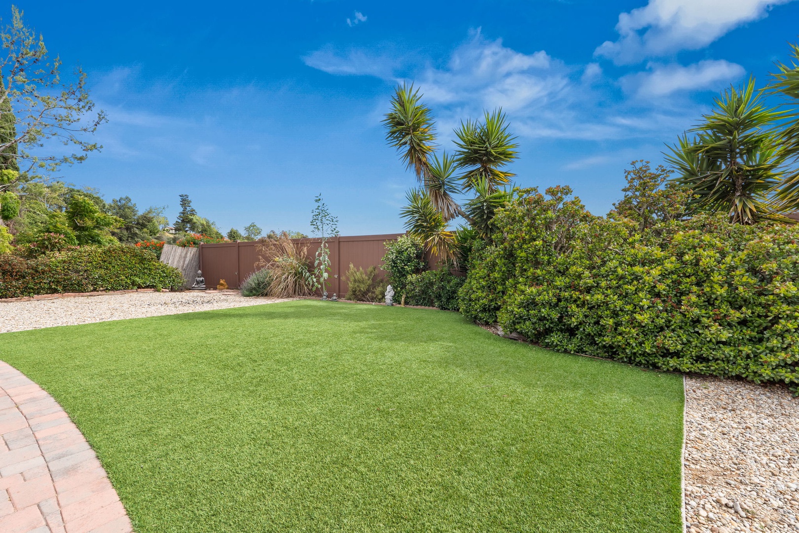 Relax on your private lawn surrounded by tropical gardens and mature plantings under endless blue skies.