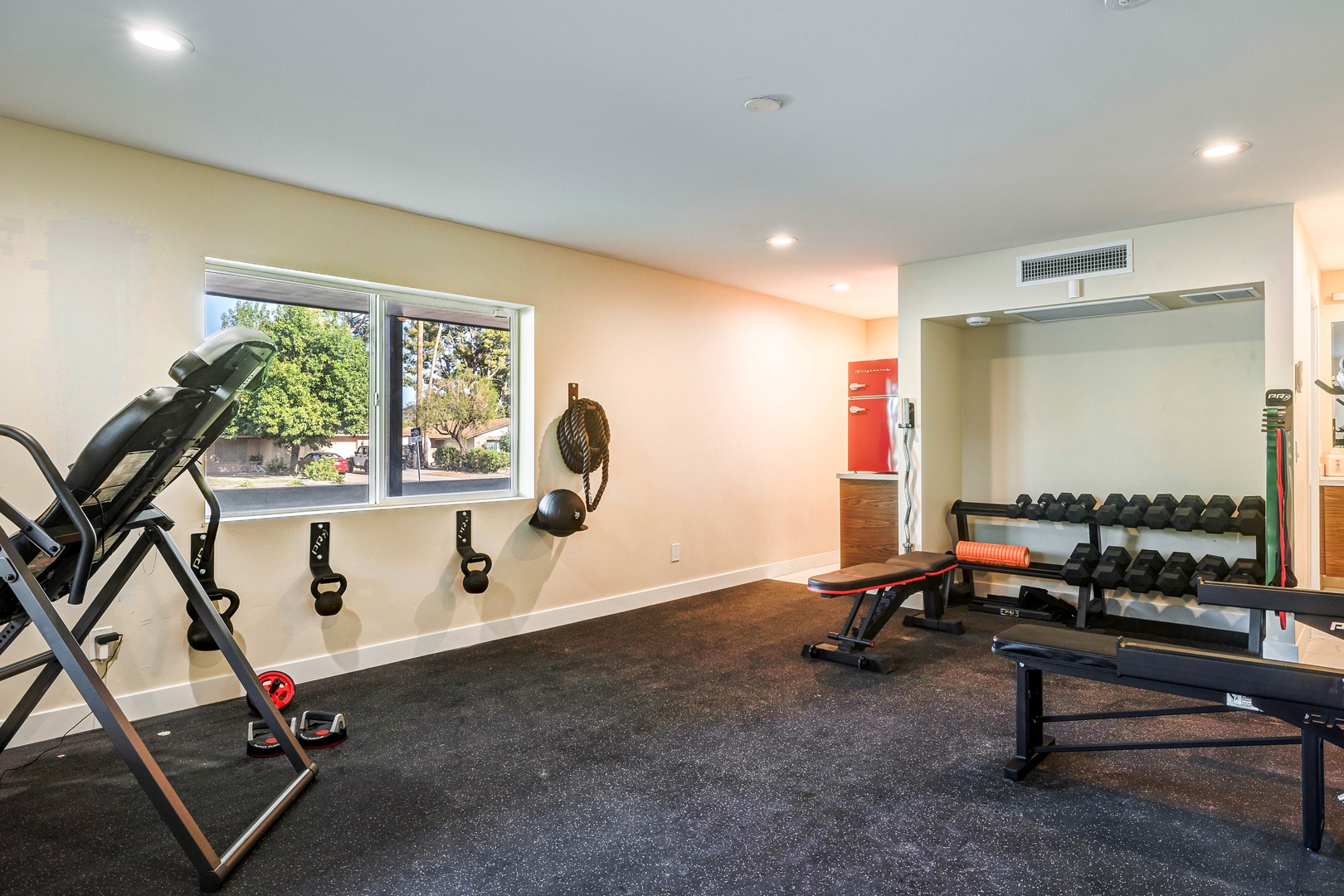 Fitness room complete with a variety of exercise equipment