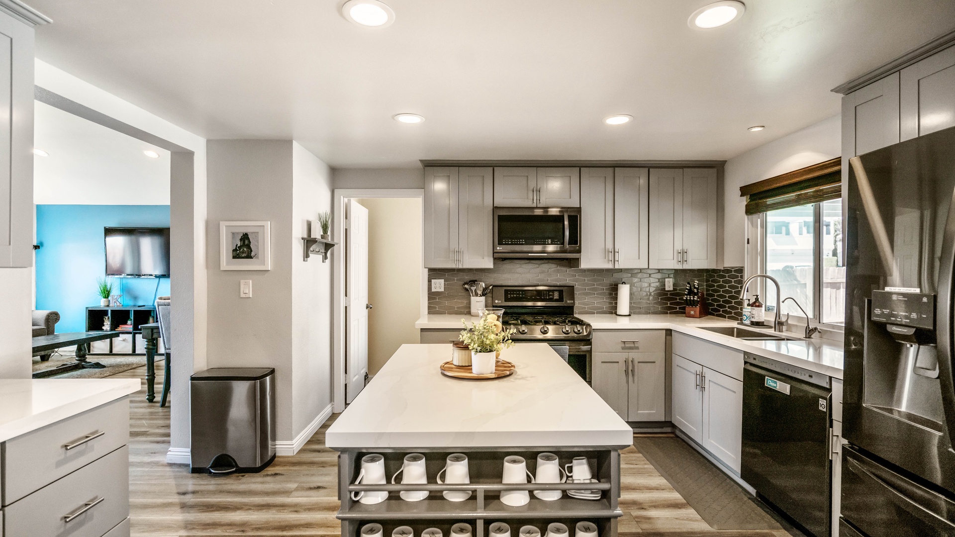 The kitchen comes equipped with silverware, cooking utensils, pots and   pans, toaster, microwave, refrigerator, coffee maker, and some small  cooking essentials.