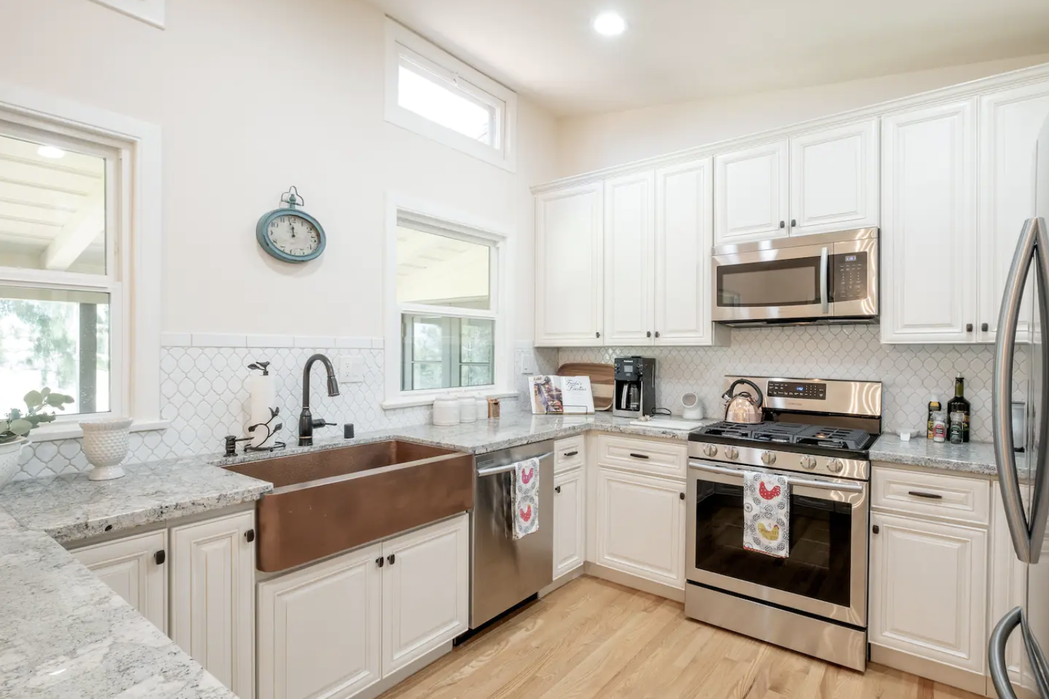 Custom kitchen with stainless steel appliances