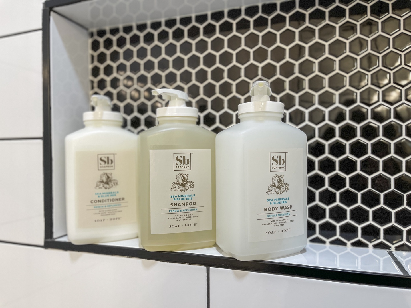Stocked with items including: shampoo, conditioner, body wash, and fresh towels. One bathroom is an ensuite bath attached to master bedroom.