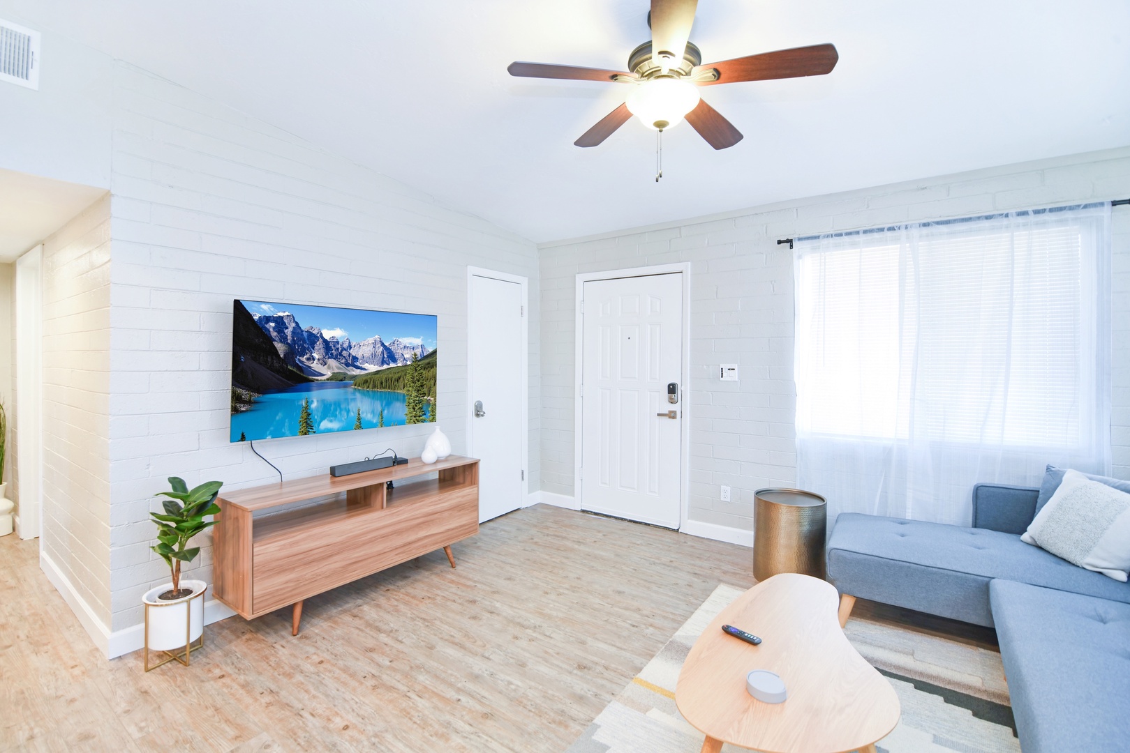 Unit 1 Living room: 55" Smart TV w/ Netflix, Hulu, Prime, and more! Wireless bluetooth speaker also available to stream your favorite music!