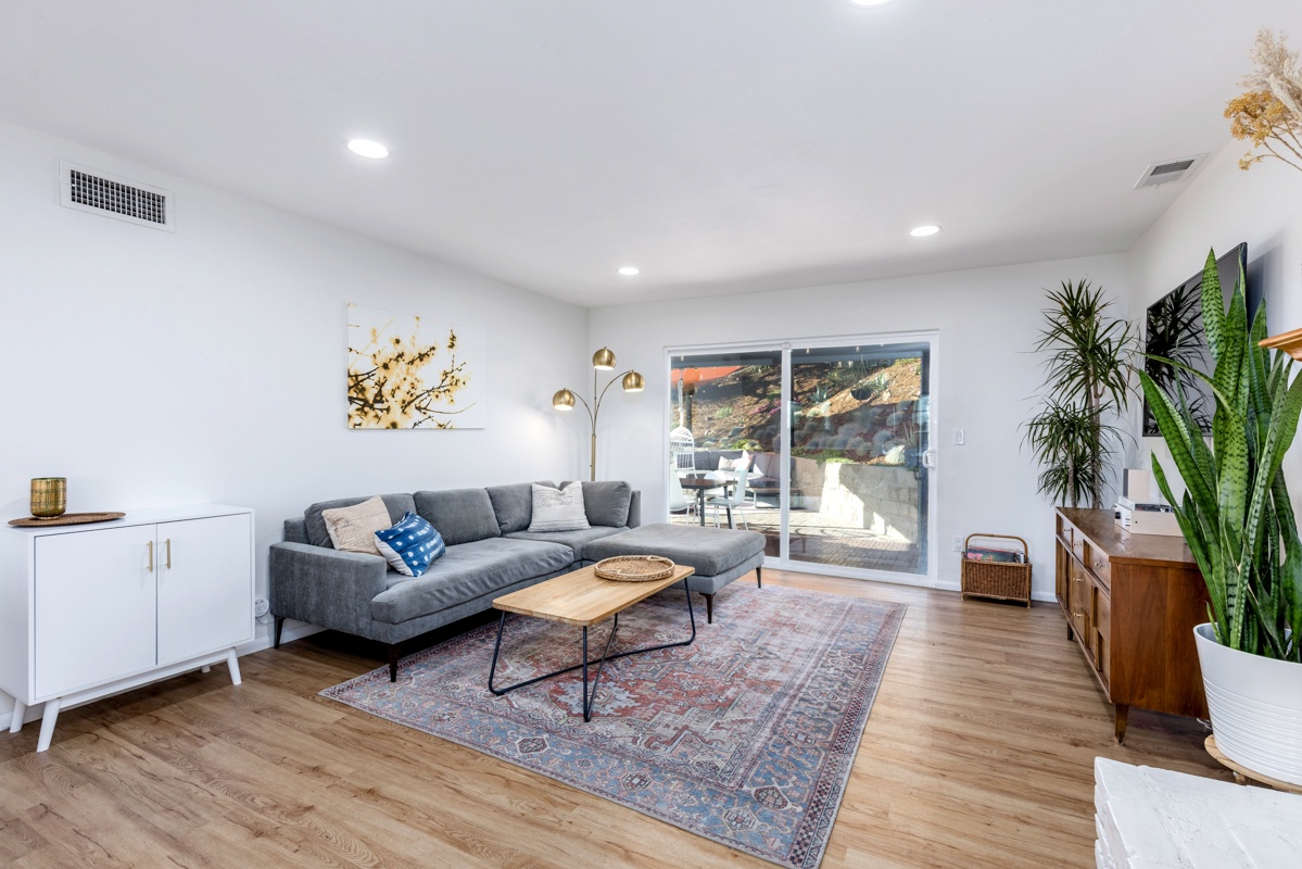 Living room with access to the private backyard