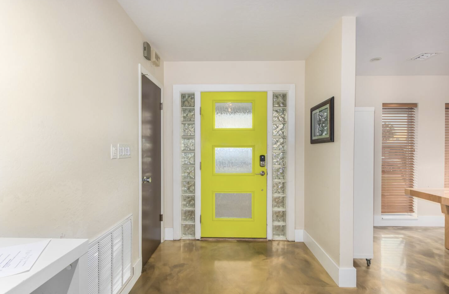 Foyer with colorful door