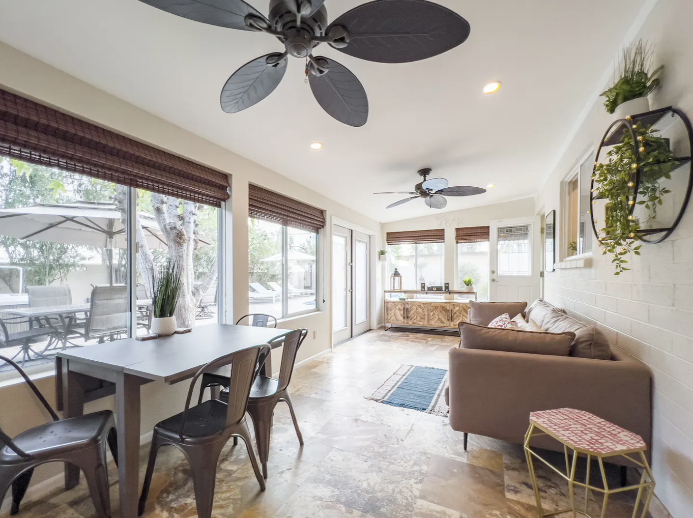 Sun room with additional seating and a dining table