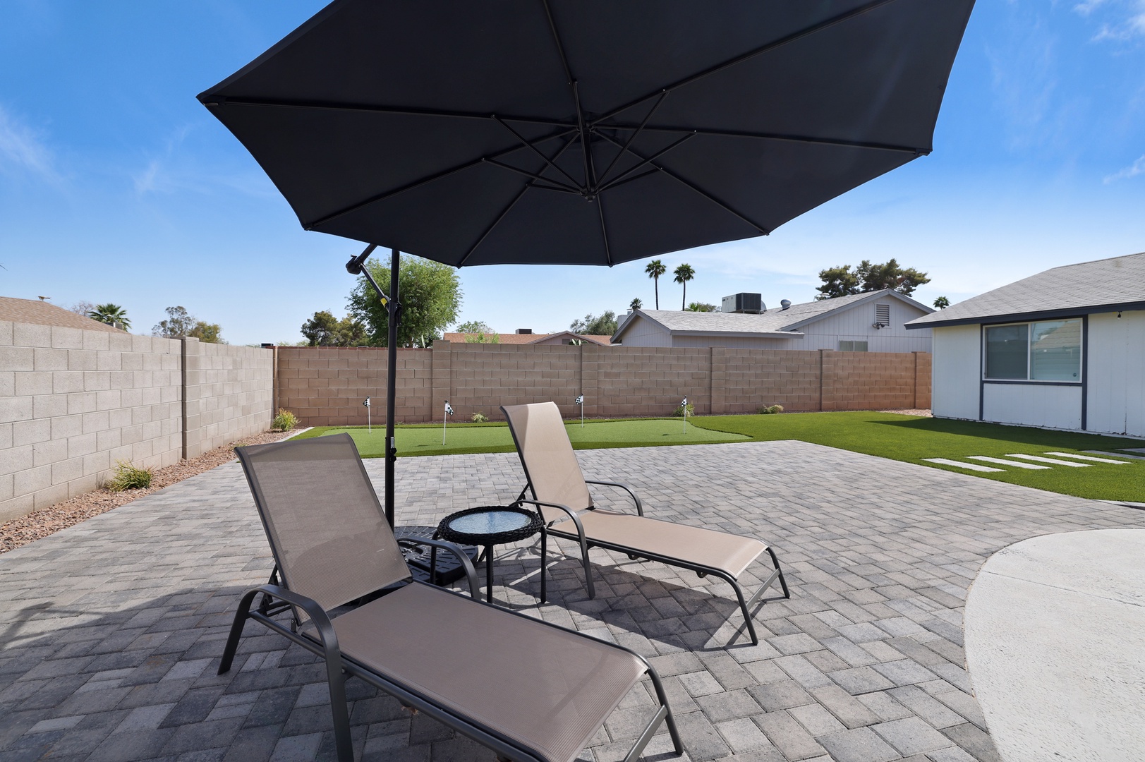 Lounge chairs out on the patio.