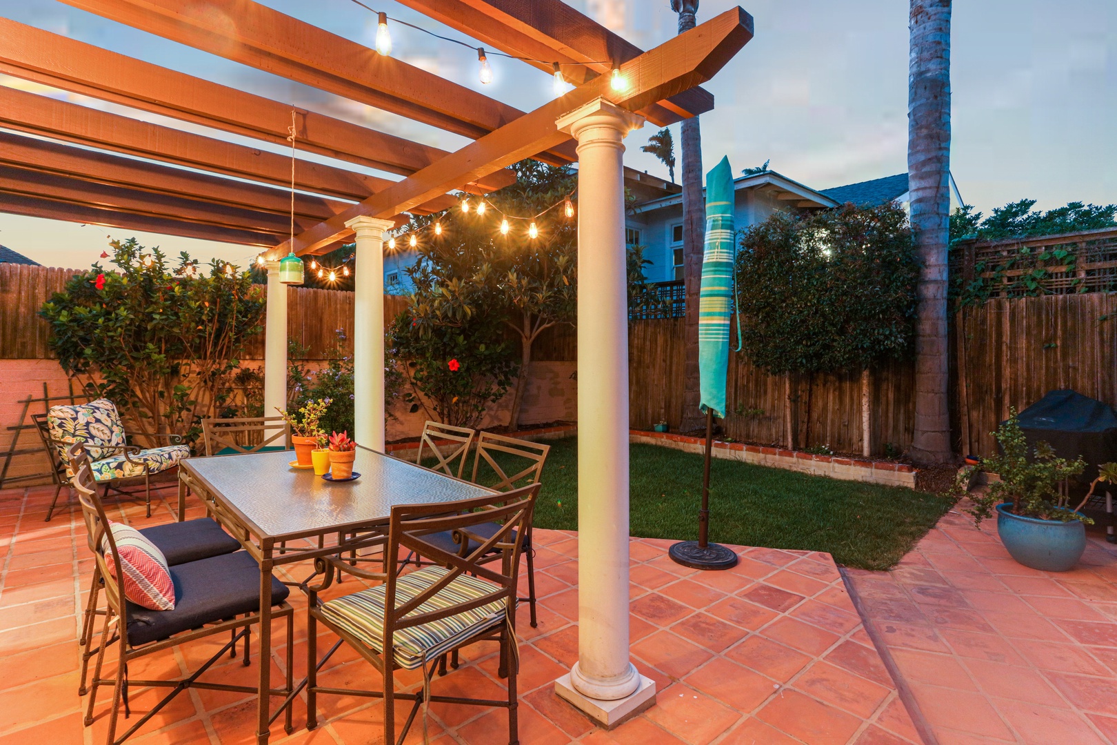 Private backyard perfect for dining outdoors or soaking in the sun