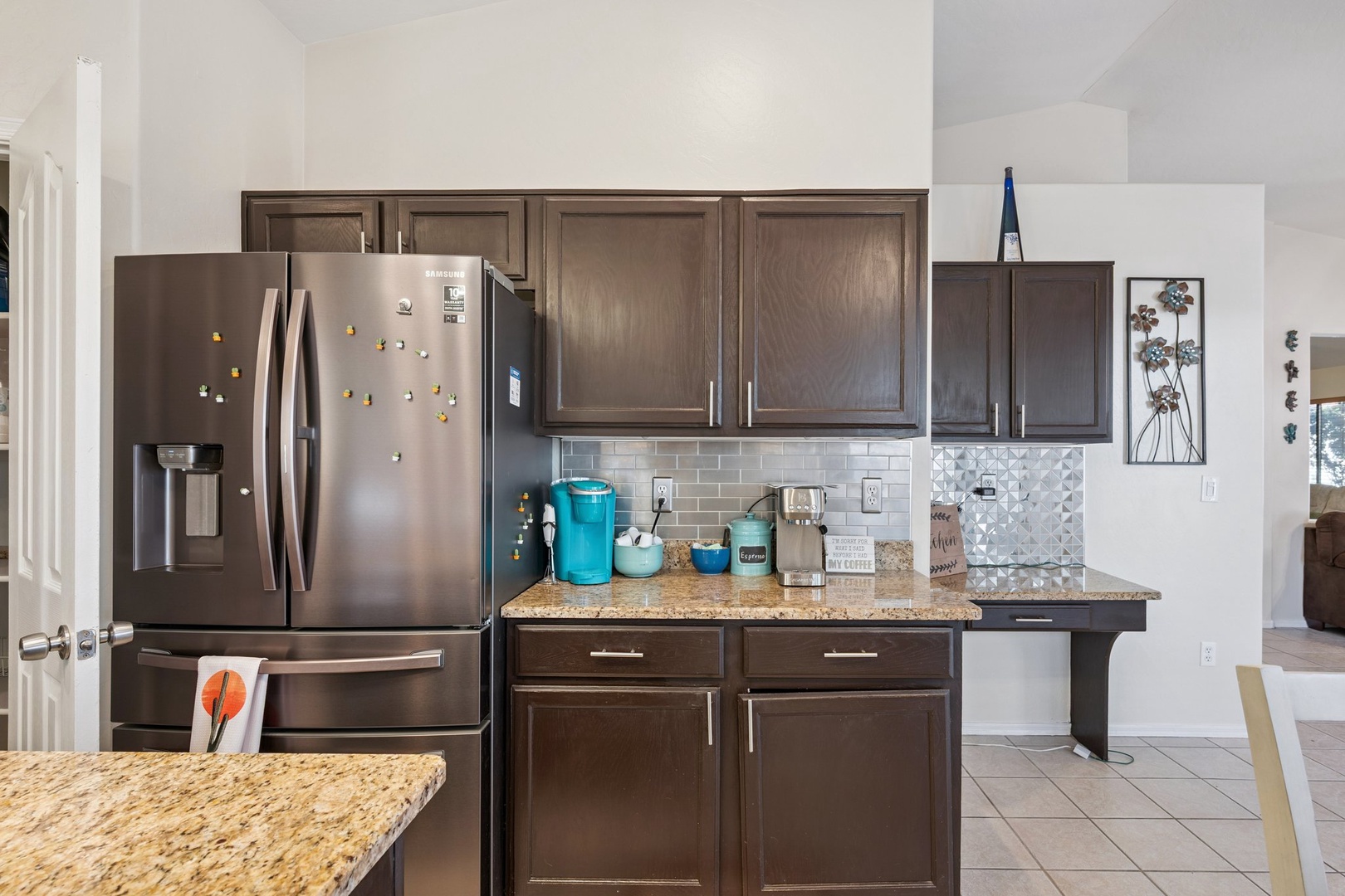 Your fully equipped kitchen features granite countertops, stainless steel appliances, and plenty of storage for preparing memorable meals during your stay.